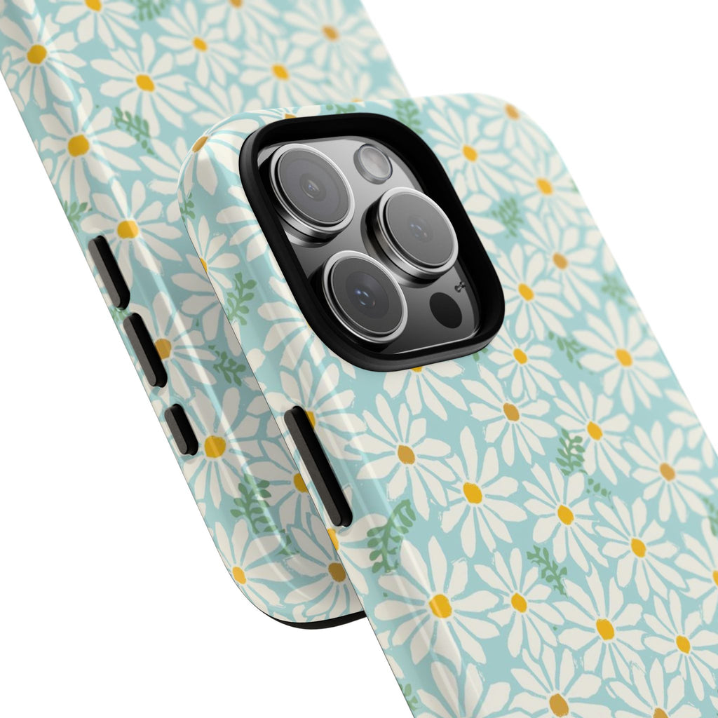 Daisies Tough iPhone 16 Pro Max Case – Glossy | sky blue, white daisy print, golden yellow centers, mint green leaves | angled view closeup of camera cutout and buttons