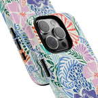 Tropica MagSafe iPhone 16 Pro Max Case – Glossy | purple, coral, pink, blue botanical tropical floral print | angled view closeup of camera cutout and buttons