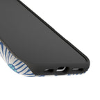 Calendula MagSafe iPhone Case – lifestyle flat lay showcasing slate blue botanical daisy design