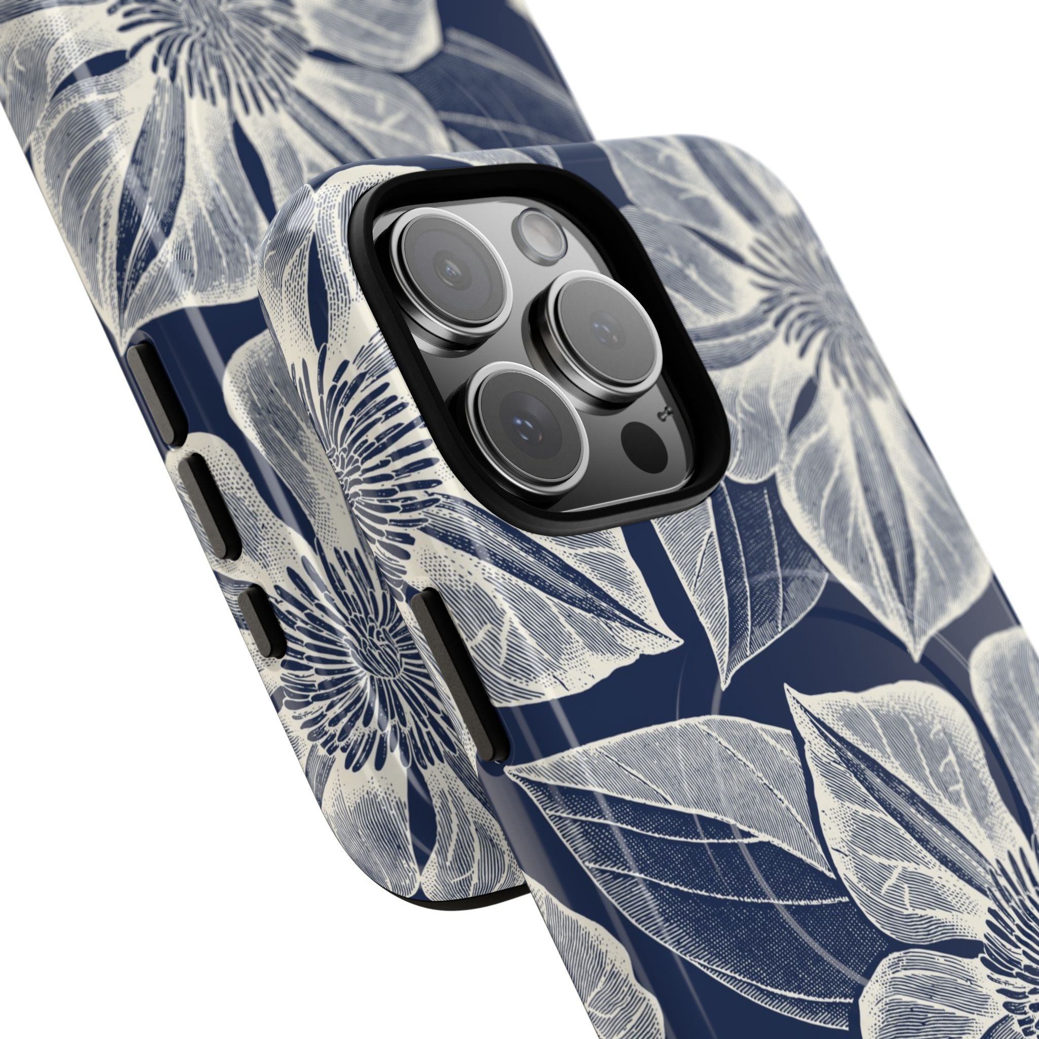 Vintage Bloom Navy MagSafe iPhone 16 Pro Max Case – Glossy | navy ground, large-scale white clematis print, engraved petal detail | side angled view closeup of camera cutout and buttons