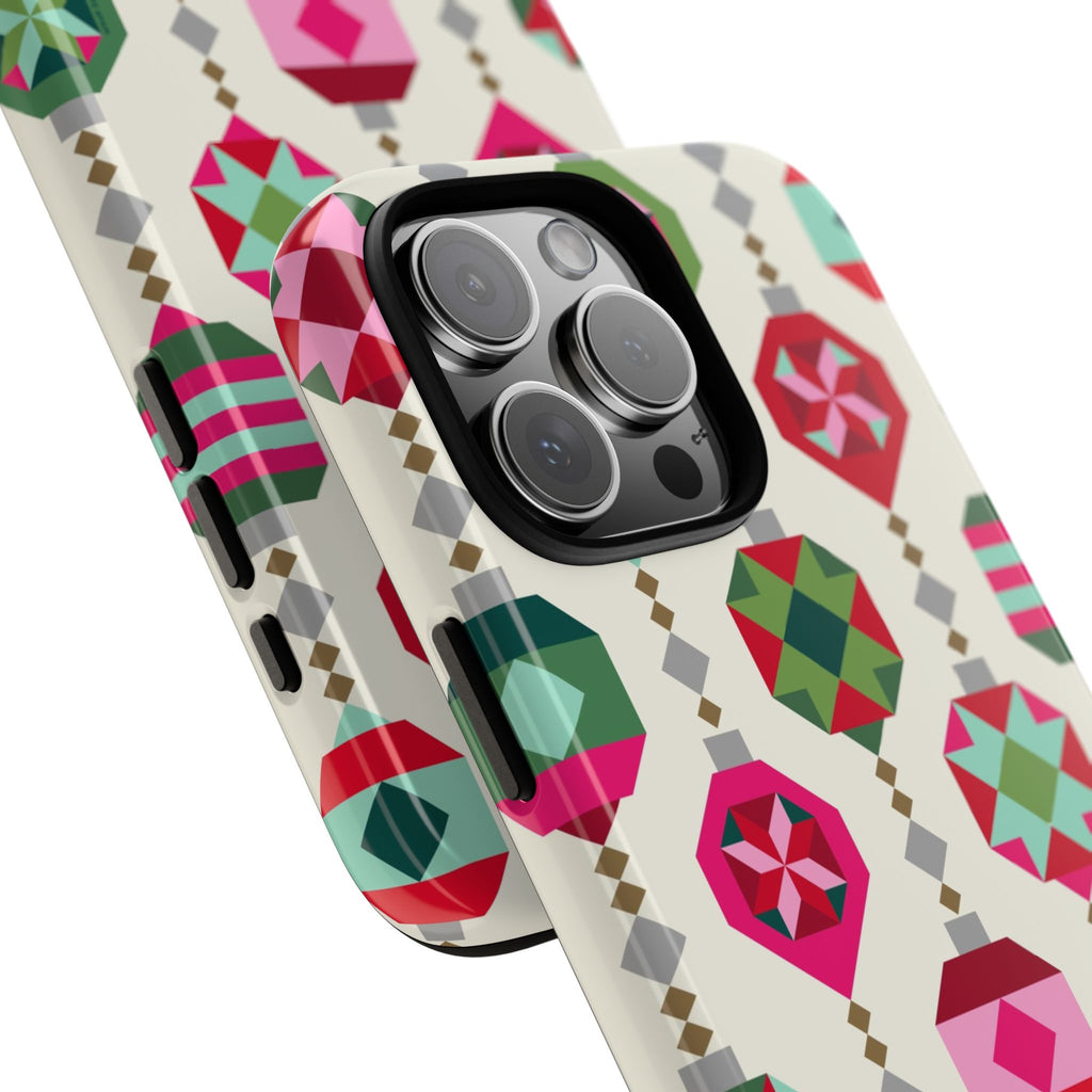 Felicity Ornaments Tough iPhone 16 Pro Max Case – lifestyle angled view | cream, red, pink, green, mint geometric quilted ornament print