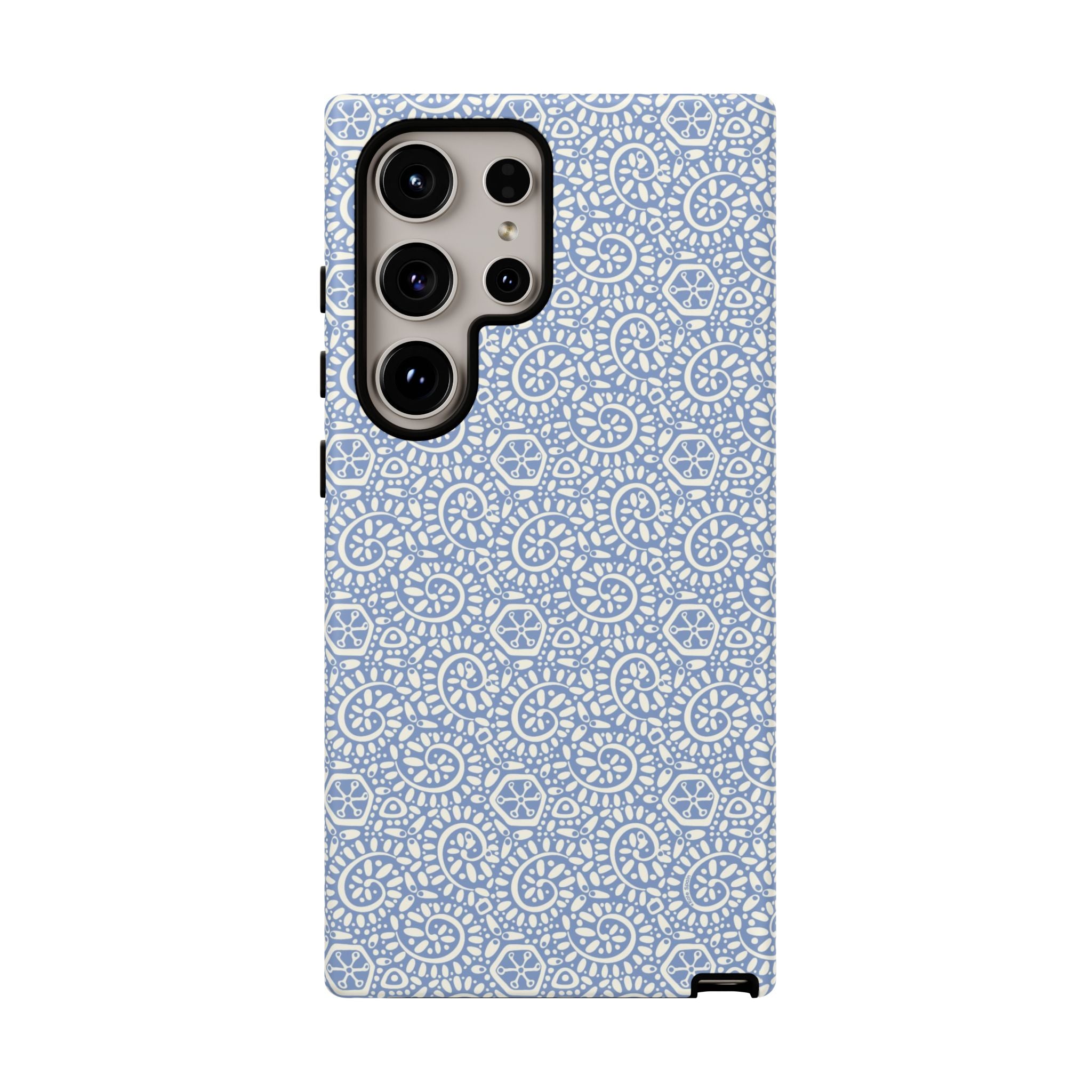 Canto Swirls Mist Samsung Galaxy S24 Ultra Matte Case — periwinkle blue hard case covered in an intricate folk-art medallion pattern of radiating white circular motifs, dot clusters, and geometric centers