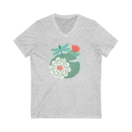 Illustrated dragonfly hovering over a green lily pad with pink and white water lily flowers on a calm pond, printed on a soft athletic gray vneck t-shirt.