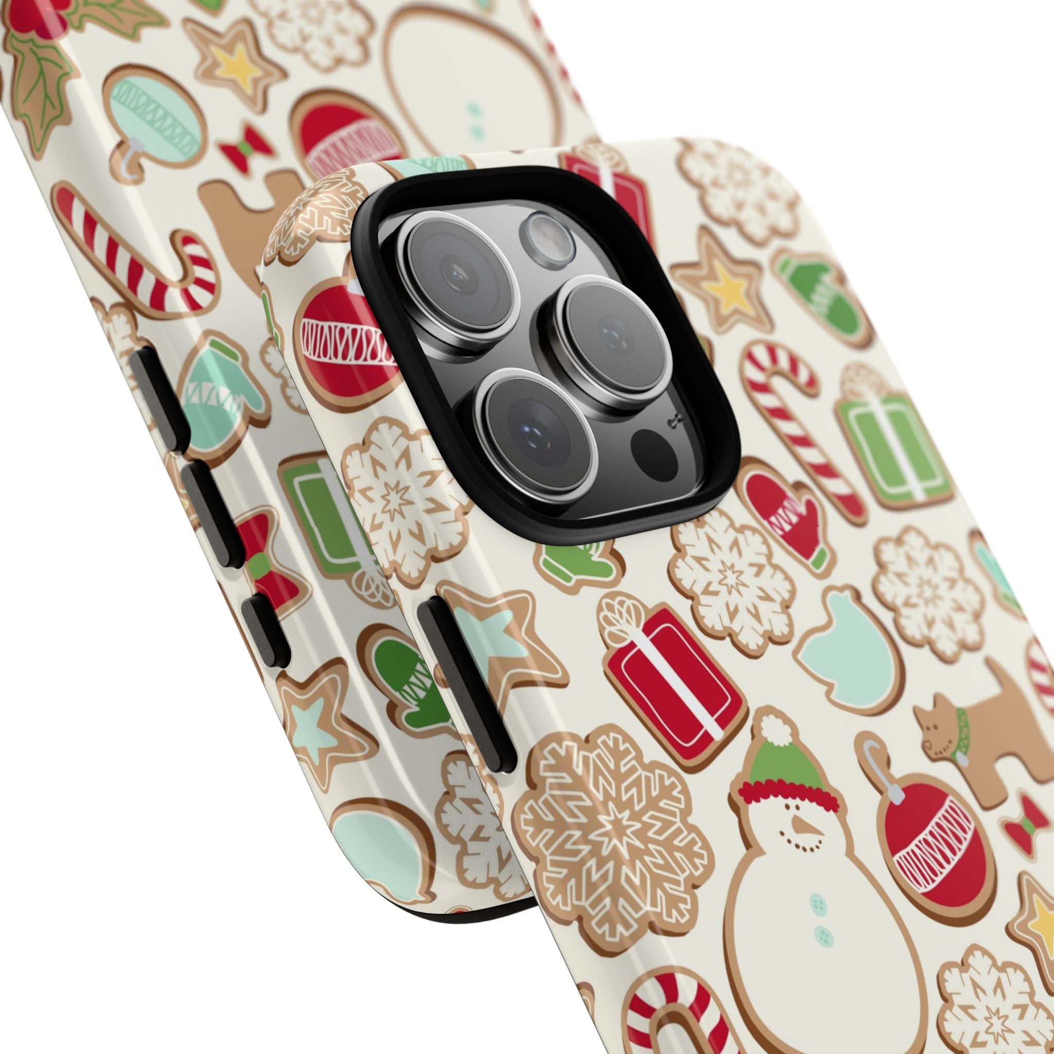 Gingerbread Cookies Tough iPhone 16 Pro Max Case – lifestyle angled view | cream, red, green gingerbread holiday cookie print