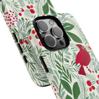 Birds and Berries Tough iPhone 16 Pro Max Case – lifestyle angled view | cream, red, green botanical cardinal berry print