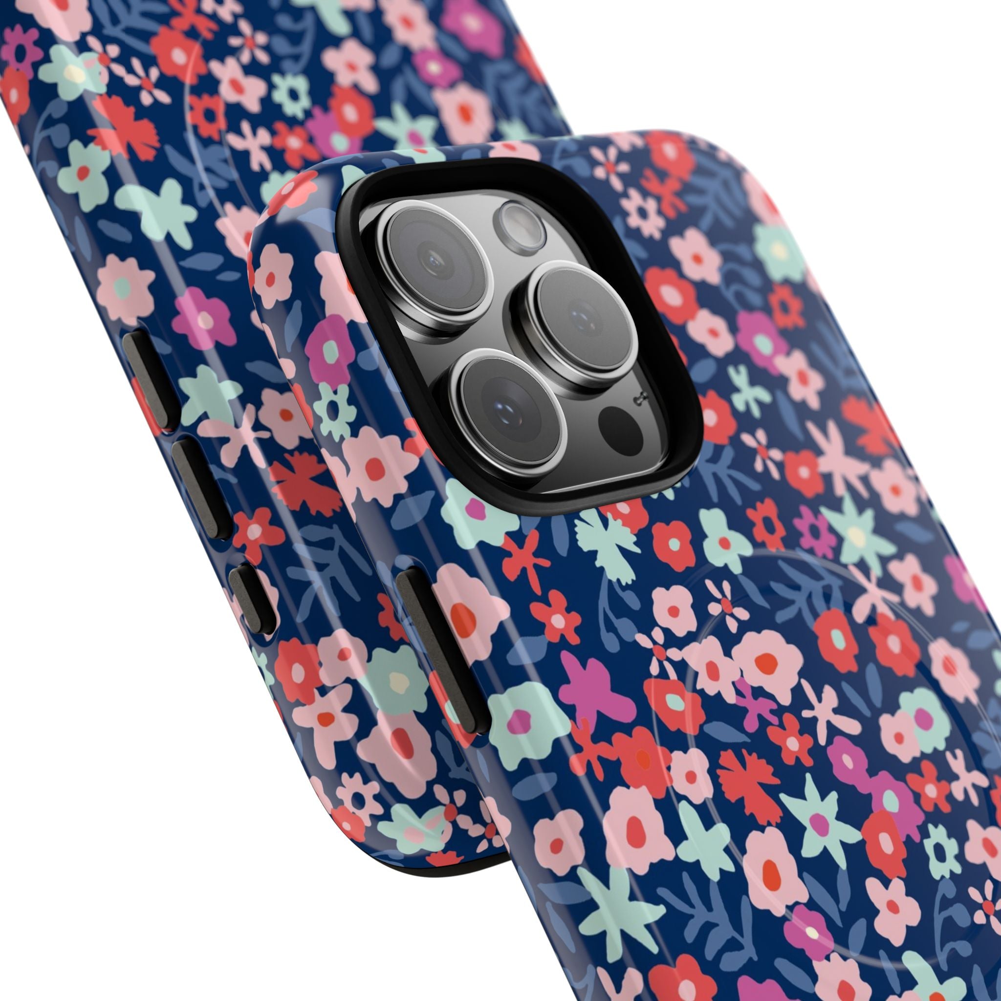Primrose MagSafe iPhone 16 Pro Max Case – Glossy | navy, pink, white ditsy floral print | angled view closeup of camera cutout and buttons