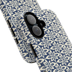 Lily Navy iPhone 17 Case – Glossy | angled view showing camera cutout and buttons — botanical phone case by Kate Spain