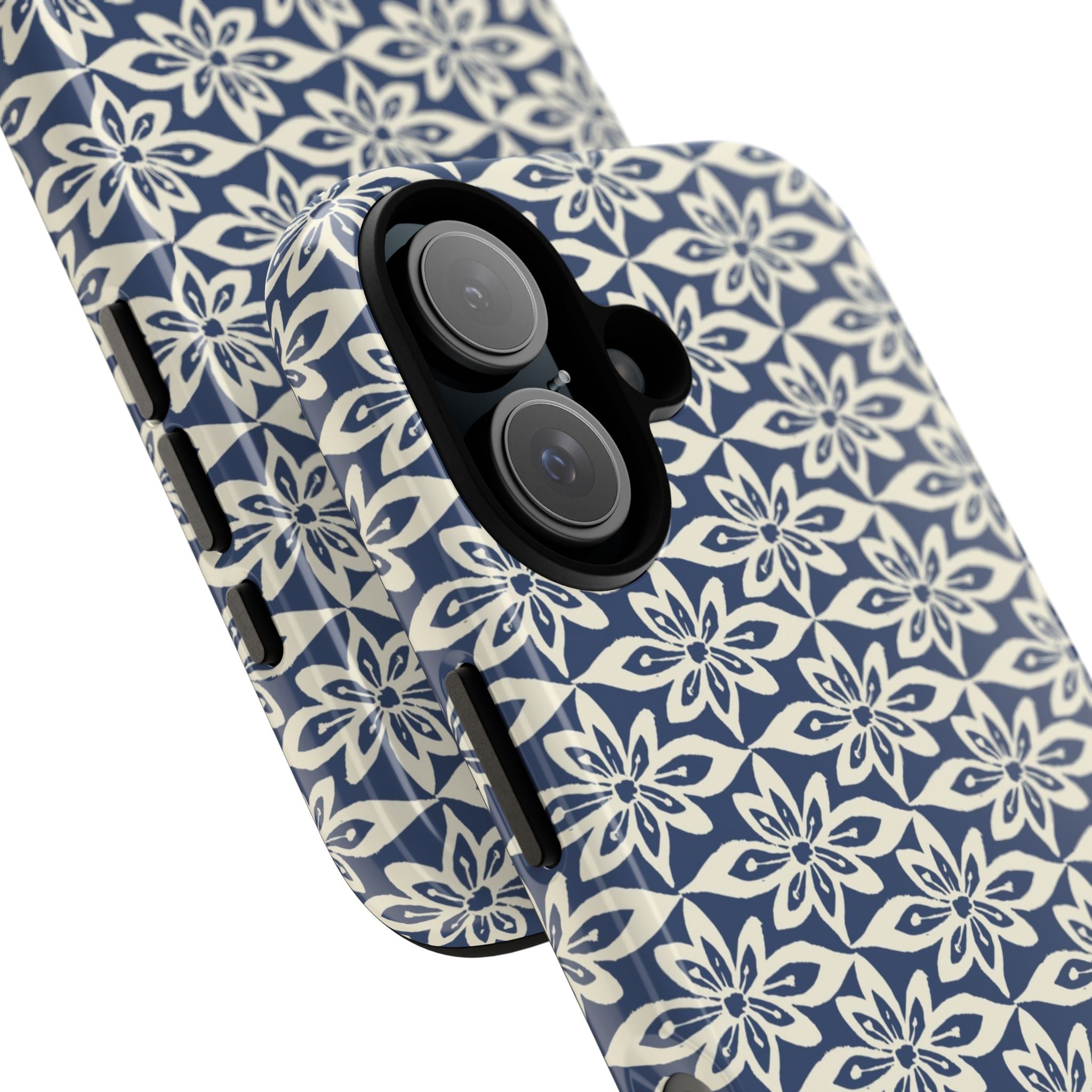 Lily Navy iPhone 17 Case – Glossy | angled view showing camera cutout and buttons — botanical phone case by Kate Spain