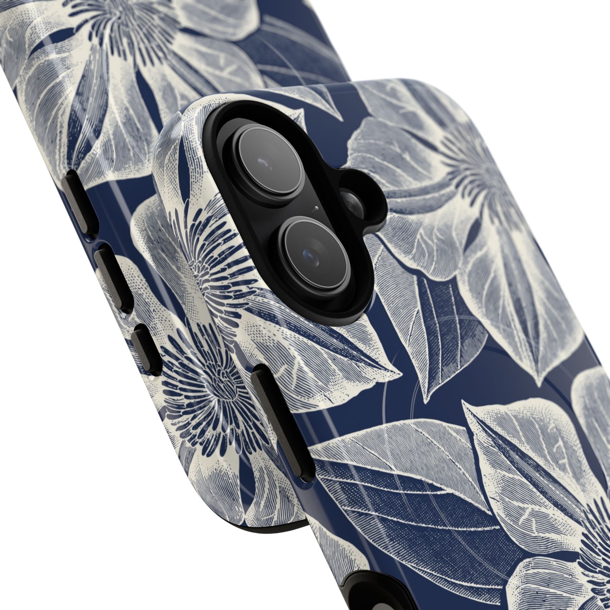 Vintage Bloom Navy MagSafe iPhone 17 Case – Glossy | navy ground, large-scale white clematis print, engraved petal detail | side angled view closeup of camera cutout and buttons