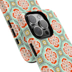 Alhambra MagSafe iPhone 16 Pro Max Case – Glossy | aqua, coral, blush geometric medallion floral print | angled view closeup of camera cutout and buttons