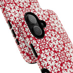 Flurry MagSafe iPhone 17 Case – Glossy | angled view closeup of camera cutout and buttons | red and cream geometric snowflake tile print