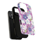 Purple Cherry Blossom MagSafe iPhone 16 Pro Max Case – Dual-layered view of case and inner lining in front of phone, with view of camera cutout and buttons | mauve, purple, blue, white cherry blossom print