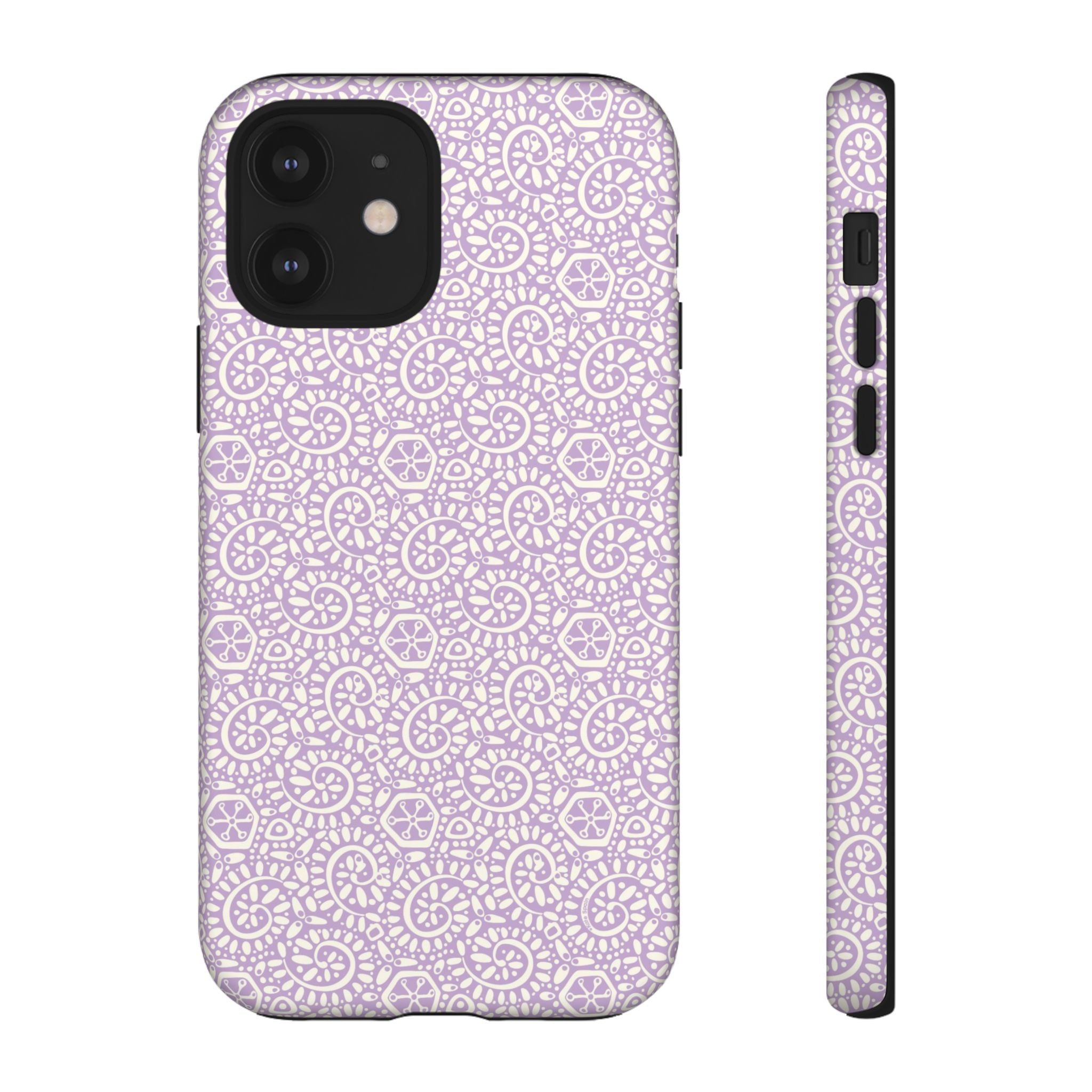 Canto Swirls Lavender iPhone 12 Matte Case — lavender hard case covered in an intricate folk-art medallion pattern of radiating circular motifs, dot clusters, and geometric centers