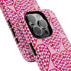 Pink Pyramid Heart Tough iPhone 16 Pro Max Case – lifestyle angled view | blush, pink, magenta, red geometric pyramid heart print