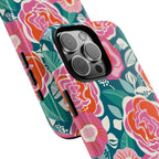 Tea Rose Teal Tough iPhone 16 Pro Max Case – lifestyle angled shot | teal, coral, pink botanical rose floral print