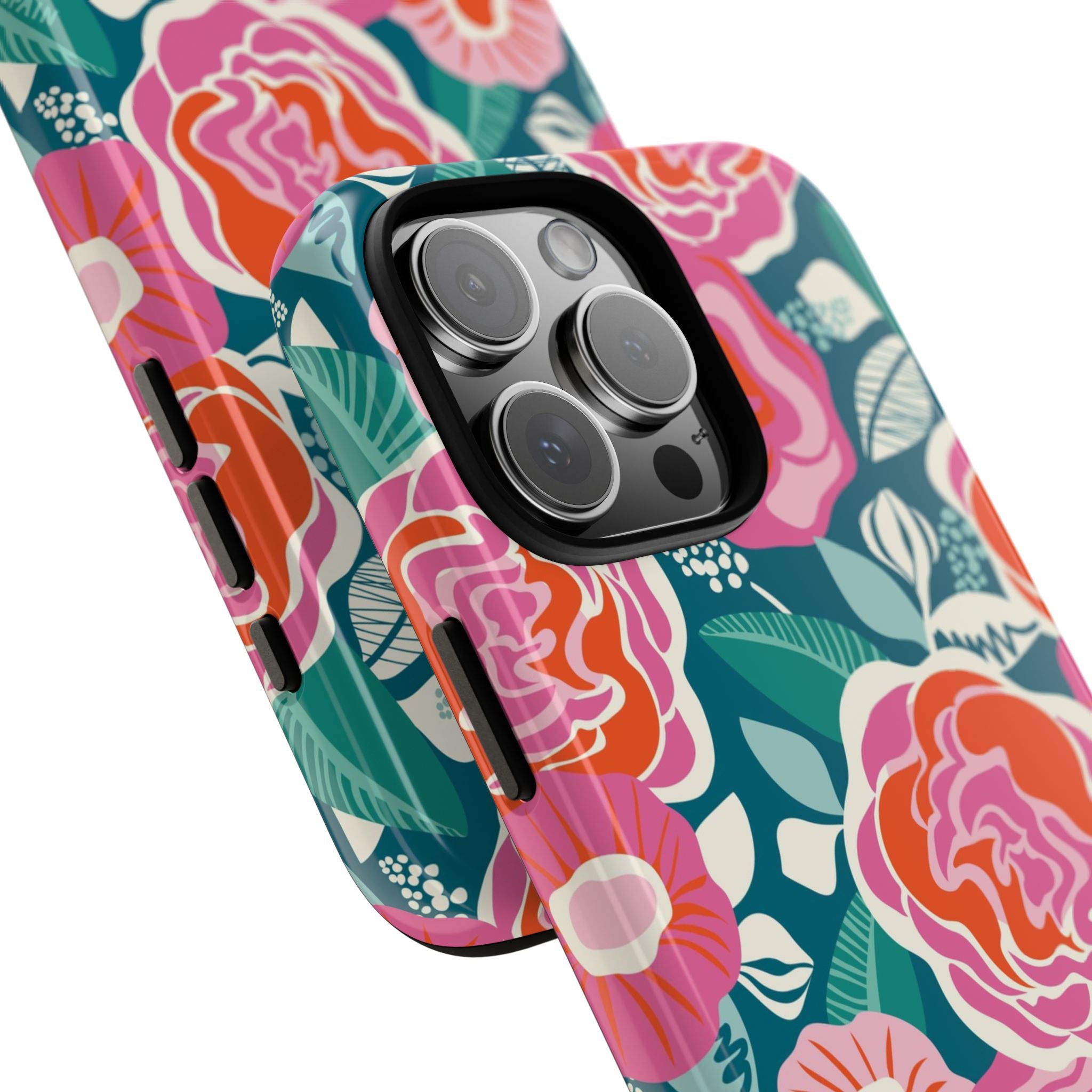 Tea Rose Teal Tough iPhone 16 Pro Max Case – lifestyle angled shot | teal, coral, pink botanical rose floral print