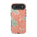 Hibiscus Coral iPhone 17 Air Glossy Case — blush pink hard case with large-scale coral red hibiscus flowers and teal-green leaves in a bold botanical linework print, densely layered across the surface
