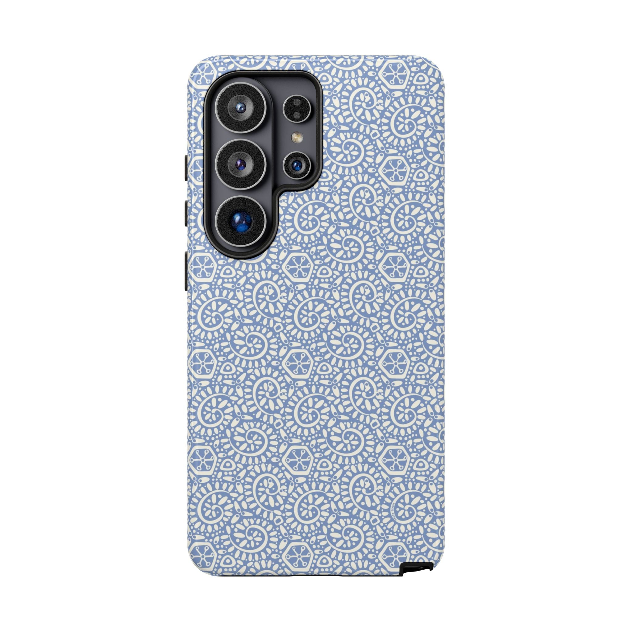 Canto Swirls Mist Samsung Galaxy S26 Ultra Glossy Case — periwinkle blue hard case covered in an intricate folk-art medallion pattern of radiating white circular motifs, dot clusters, and geometric centers