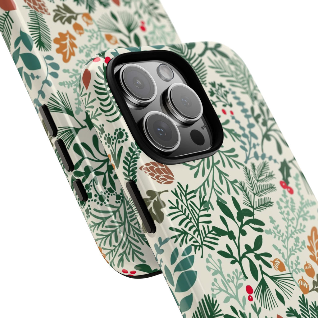 Juniper Tough iPhone 16 Pro Max Case – lifestyle/angled shot | cream, green, red botanical woodland print