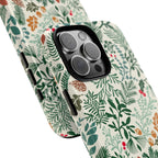 Juniper Tough iPhone 16 Pro Max Case – lifestyle/angled shot | cream, green, red botanical woodland print