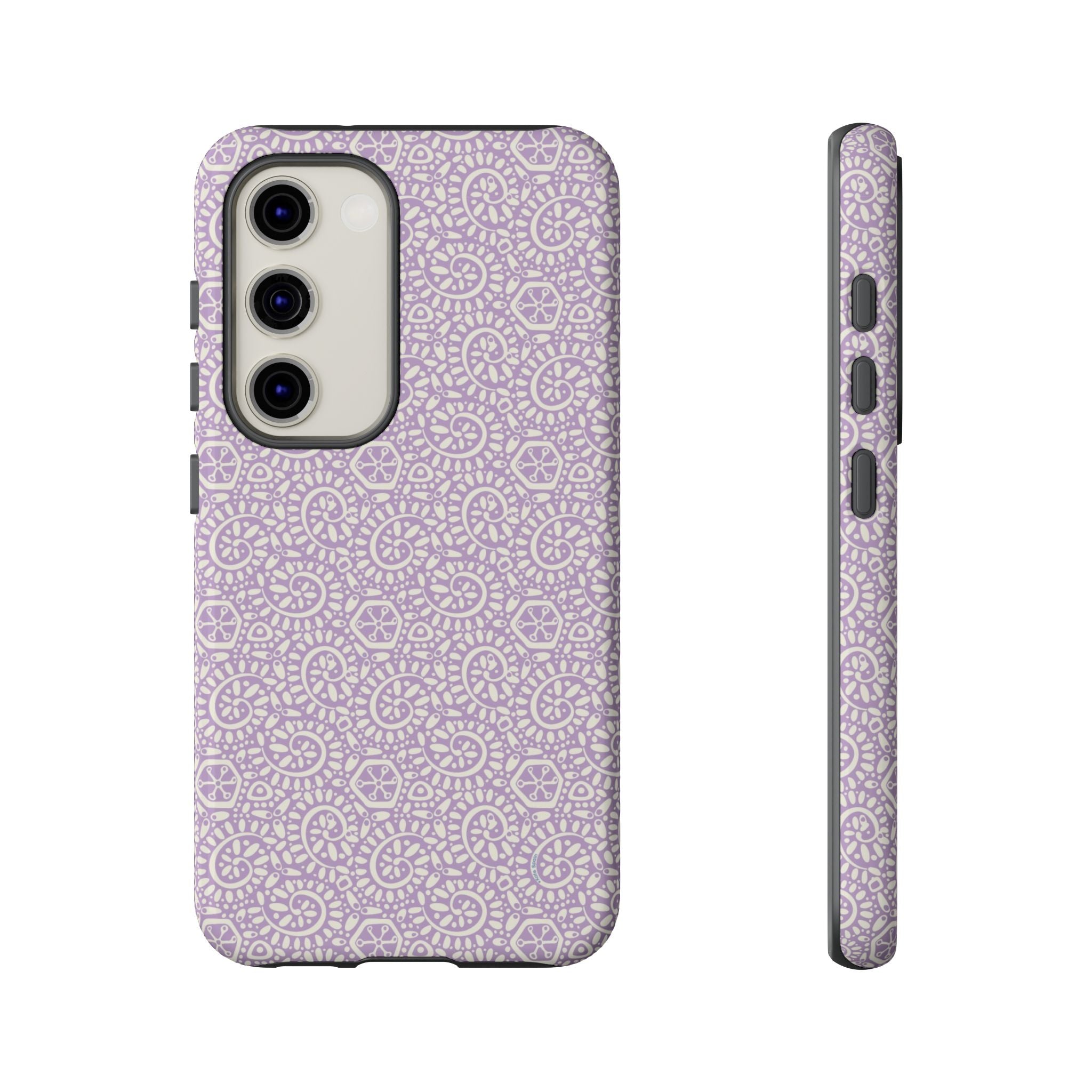Canto Swirls Lavender Samsung Galaxy S23 Glossy Case — lavender hard case covered in an intricate folk-art medallion pattern of radiating circular motifs, dot clusters, and geometric centers