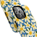 Shasta Daisy Tough iPhone 16 Pro Max Case – lifestyle angled shot | blue, cream, yellow daisy floral print