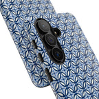 Phone case with blue and white geometric pattern on a white background