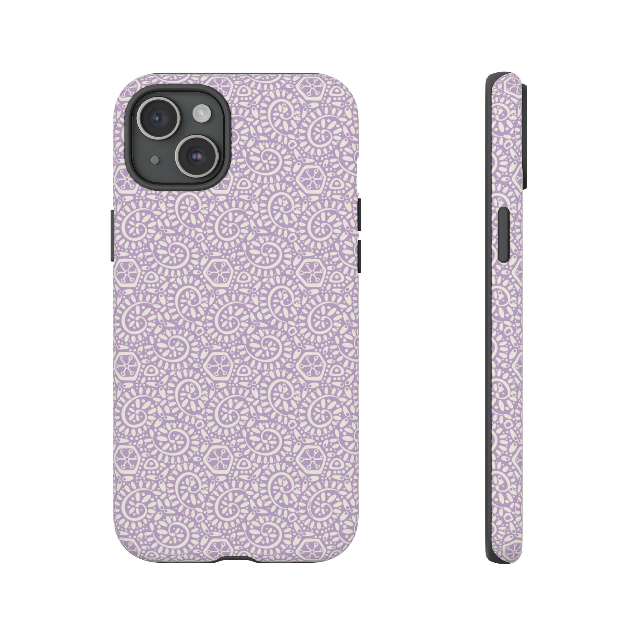 Canto Swirls Lavender iPhone 15 Plus Matte Case — lavender hard case covered in an intricate folk-art medallion pattern of radiating circular motifs, dot clusters, and geometric centers