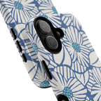 Calendula MagSafe iPhone 17 Case – Glossy | periwinkle, cream, teal graphic daisy floral print | angled view closeup of camera cutout and buttons