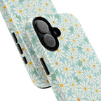 Daisies MagSafe iPhone 17 Case – Glossy | sky blue, white daisy print, golden yellow centers, mint green leaves | angled view closeup of camera cutout and buttons