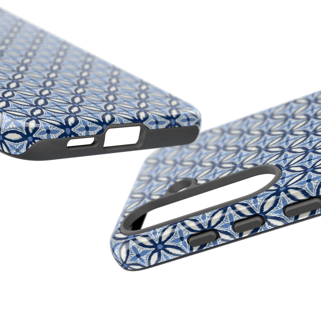 Light blue Samsung Galaxy case with navy and periwinkle ikat geometric pattern — botanical phone case by Kate Spain for Floriori. Close up image of button and port cutouts.