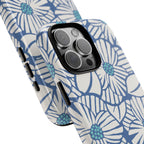 Calendula Tough iPhone 16 Pro Max Case – lifestyle angled shot | periwinkle, cream, teal graphic daisy floral print