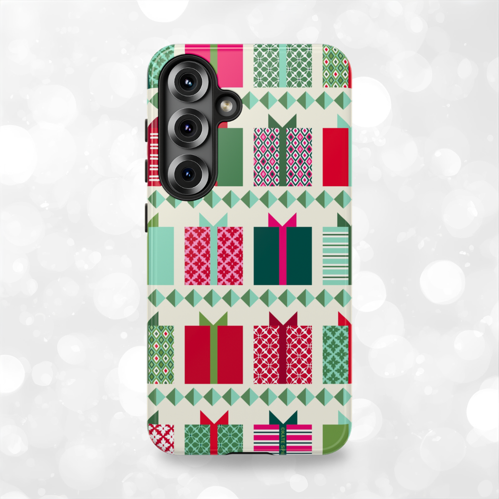 All Wrapped Up Samsung S25 Case in| cream, red, pink, green, mint geometric gift wrap holiday print over a glittering snowscape background