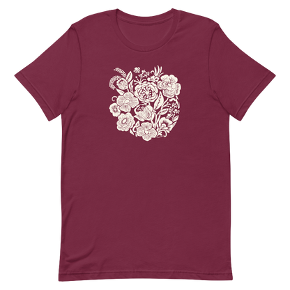 Maroon t-shirt with a white floral design on a white background