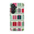 All Wrapped Up Samsung Galaxy S26 Case – elegant view of phone in case in cream, red, pink, green, mint geometric gift wrap holiday print