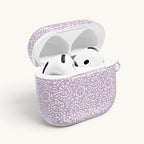 AirPods Gen 4 case, back side of case showing opening for lid hinge – Glossy | soft white swirl and medallion pattern on pastel lavender ground