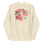 Folded off-white colored hoodie sweatshirt with large tropical flower design and small hummingbird graphic.