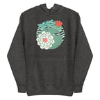 Illustrated dragonfly hovering over a green lily pad with pink and white water lily flowers on a rippled circular pond, printed on a soft premium charcoal gray heather colored hoodie sweatshirt.