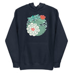 Illustrated dragonfly hovering over a green lily pad with pink and white water lily flowers on a rippled circular pond, printed on a soft premium navy blue colored hoodie sweatshirt.