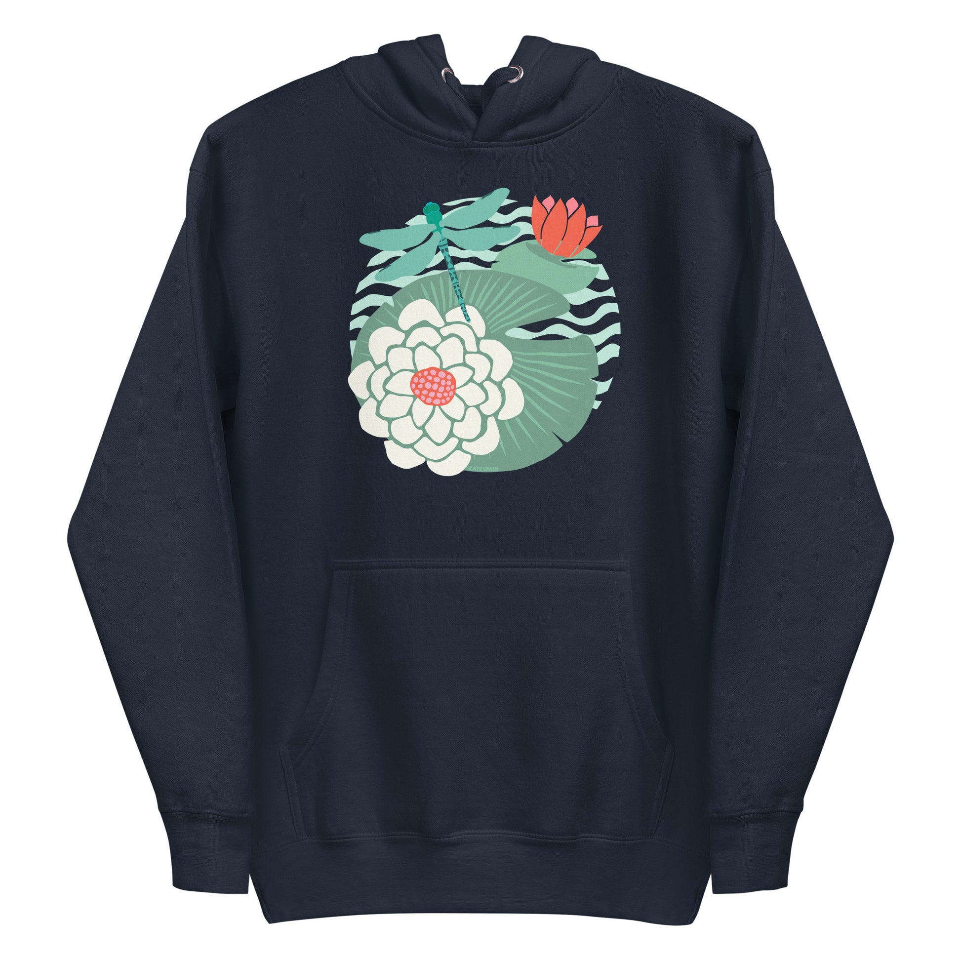 Illustrated dragonfly hovering over a green lily pad with pink and white water lily flowers on a rippled circular pond, printed on a soft premium navy blue colored hoodie sweatshirt.
