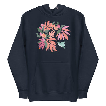Folded navy blue colored hoodie sweatshirt with large tropical flower design and small hummingbird graphic.