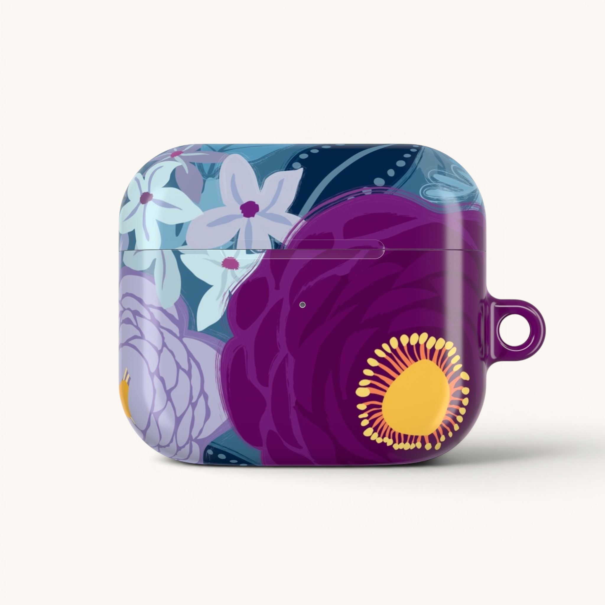 Floriori Bloomerie Violet AirPods Pro case with a bold floral print in deep violet, plum, and light blue. Features a glossy finish and carabiner loop.