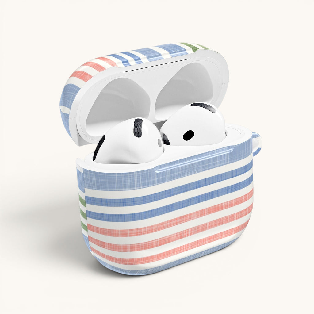 floriori Cabana Stripe Pastel AirPods Case with blue, coral, and sage green stripes. Features chambray texture and glossy finish.