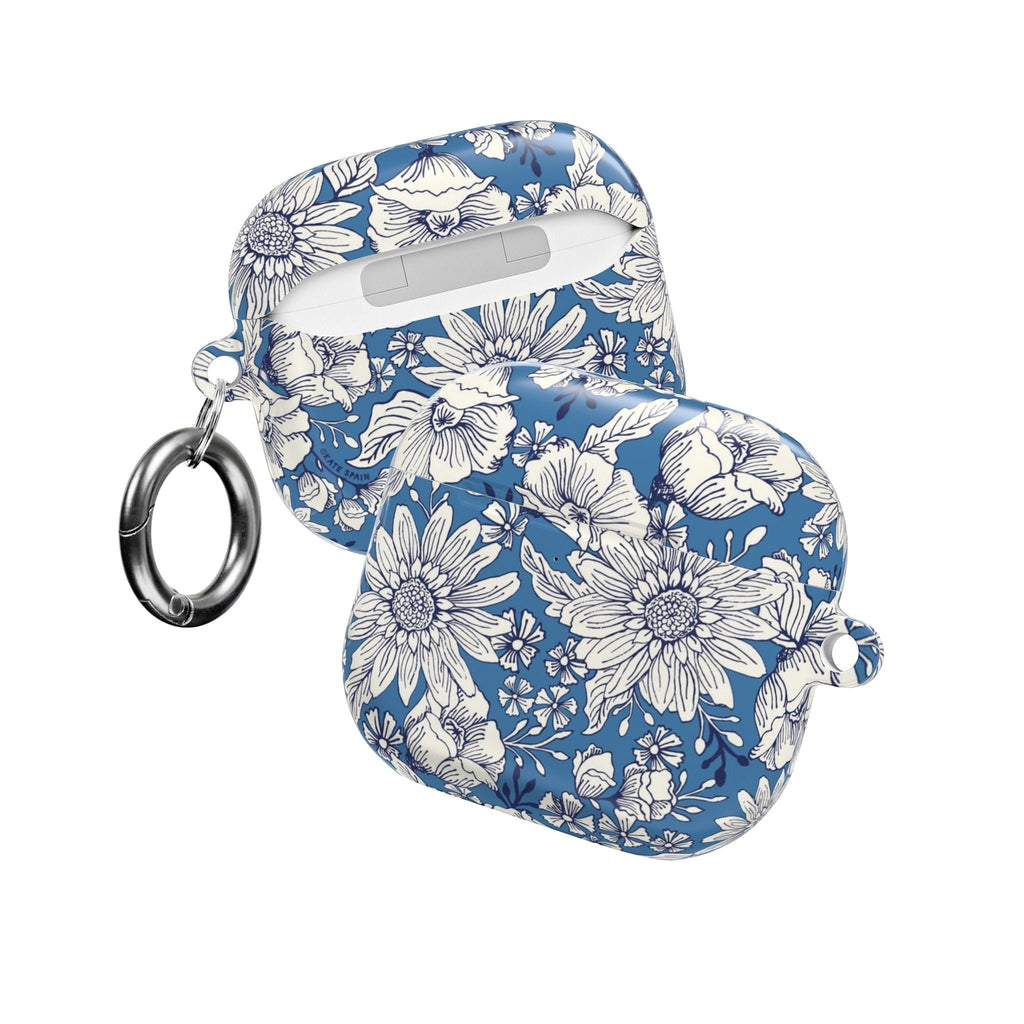 floriori Jardin Blue AirPods case featuring a white hand drawn botanical toile print on a deep blue glossy polycarbonate shell