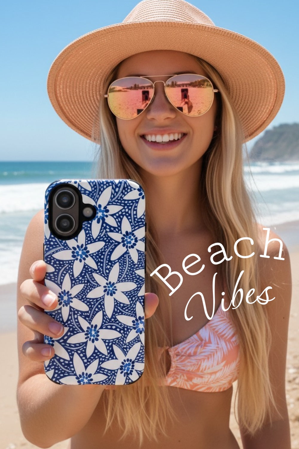 Starflower Samsung case in navy and white held by woman at the beach — botanical phone case by Kate Spain