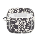 floriori AirPods case with sophisticated and energetic hand painted flower silhouettes. black floral on a cream glossy background. back view