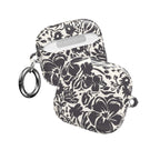 floriori AirPods case with sophisticated and energetic hand painted flower silhouettes. black floral on a cream glossy background. front and back view