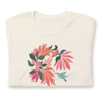 Pale off-white cream colored premium crewneck tshirt with large tropical flower design and small hummingbird graphic.